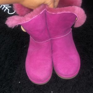 Ugg boots with a button on the side
